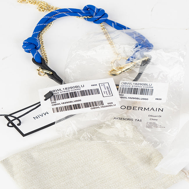 Gennie String Charm